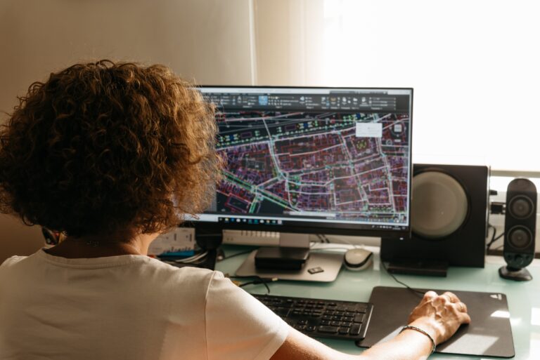A woman using CAD for BIM purposes.